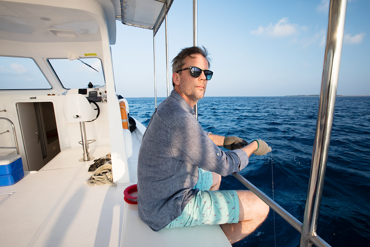 Maldivian style sunset fishing Dhigali Maldives